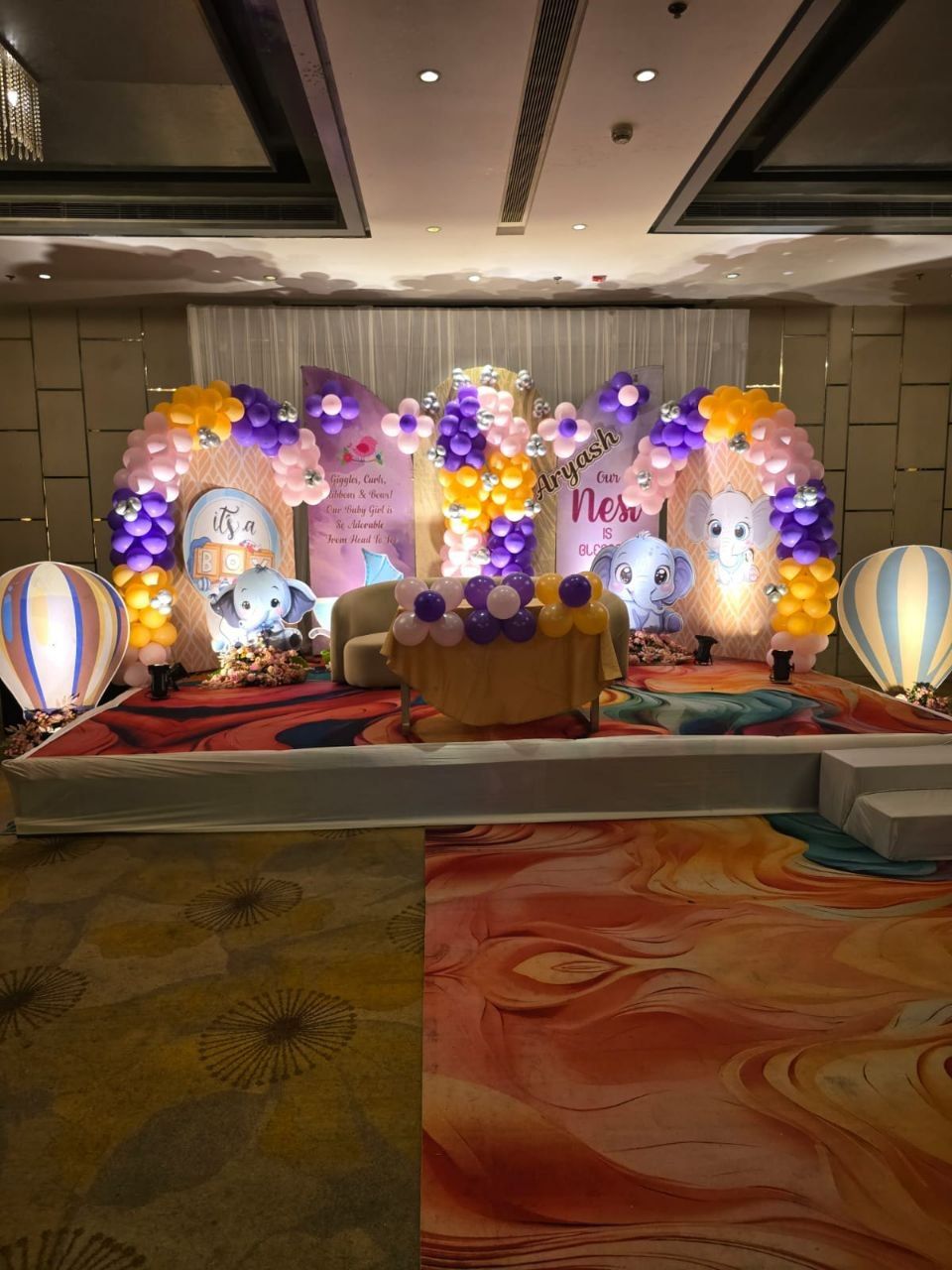 Purple and gold elephant theme baby shower stage decoration by Mayur Events Bilaspur