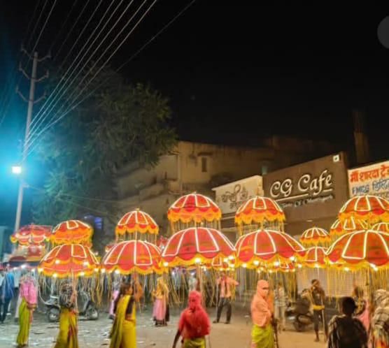 Traditional decorated umbrella (chatri) baraat procession at night by Mayur Events Bilaspur