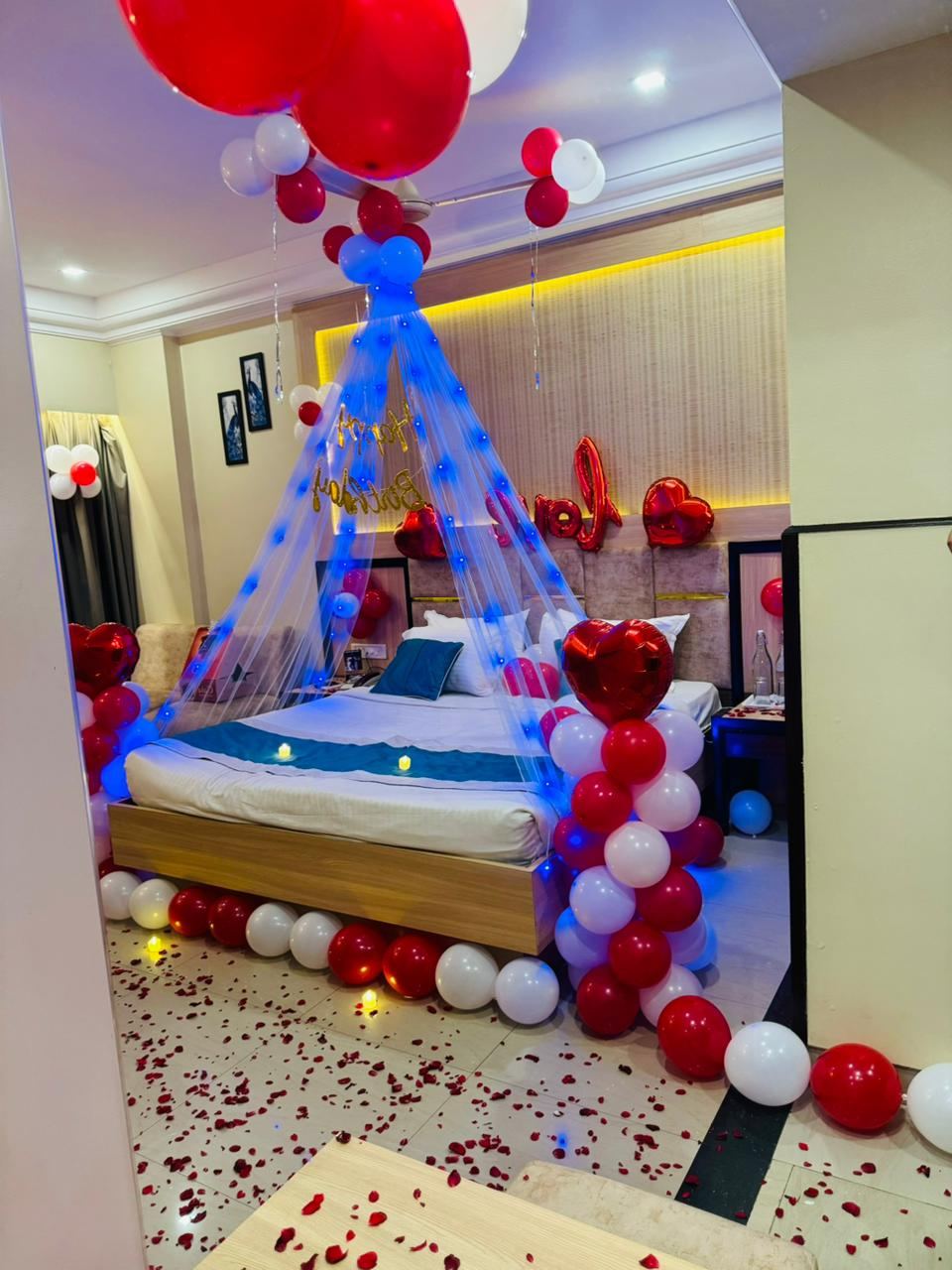 Birthday room decoration with balloons and rose petals by Mayur Events Bilaspur