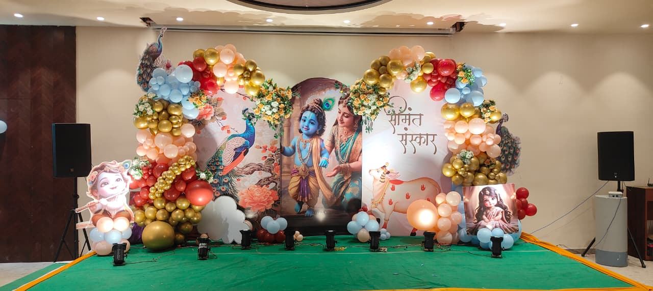 Radha Krishna themed godh bharai baby shower stage decoration by Mayur Events Bilaspur