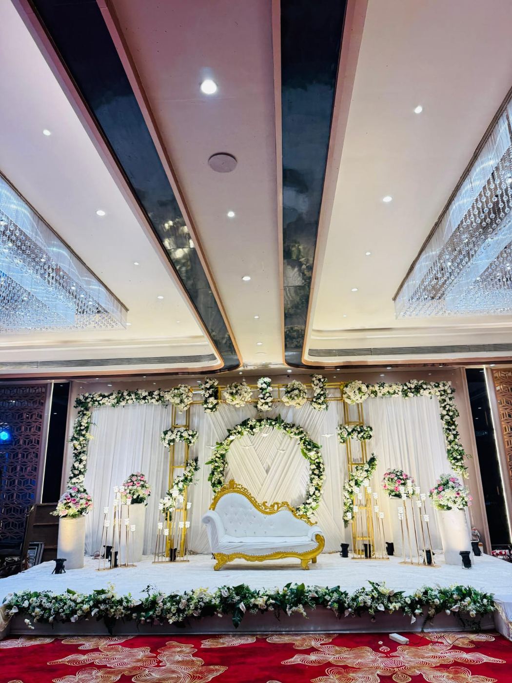Elegant white floral wedding reception stage decoration by Mayur Events Bilaspur