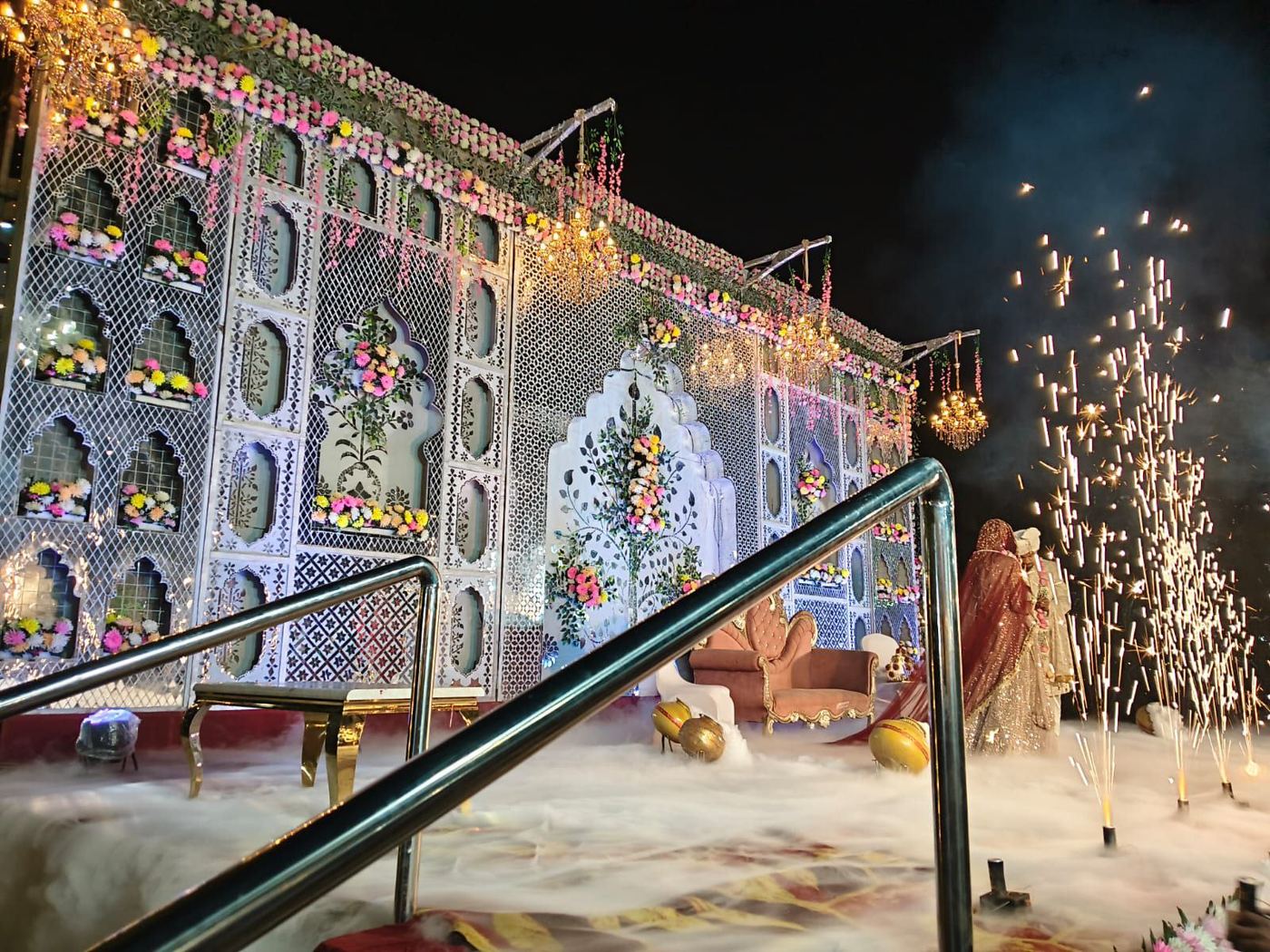 Bride and groom grand entry with cold pyro and fireworks effects, wedding decoration by Mayur Events Bilaspur
